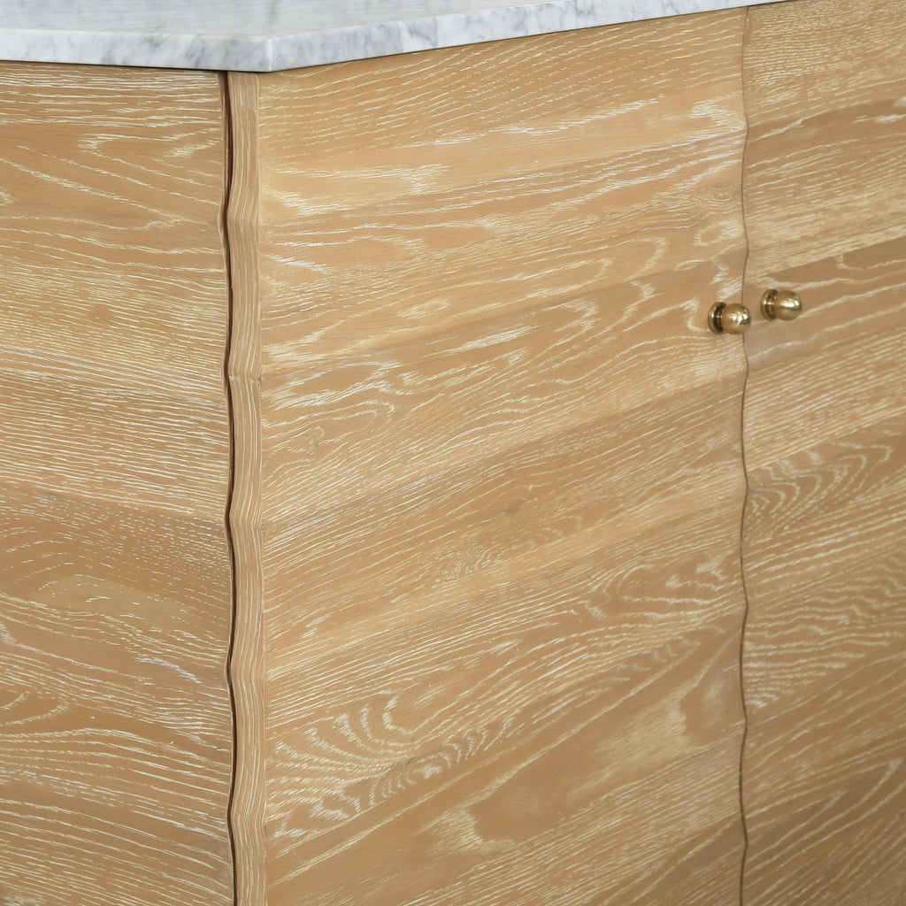 Worlds Away BATH VANITY WITH HORIZONTAL FLUTED DETAIL IN CERUSED OAK WITH WHITE MARBLE TOP, PORCELAIN SINK, AND POLISHED BRASS KNOBS