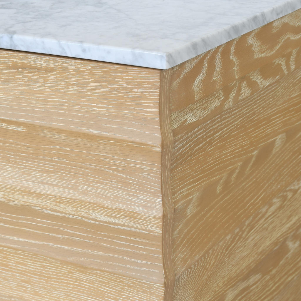 Worlds Away BATH VANITY WITH HORIZONTAL FLUTED DETAIL IN CERUSED OAK WITH WHITE MARBLE TOP, PORCELAIN SINK, AND POLISHED BRASS KNOBS