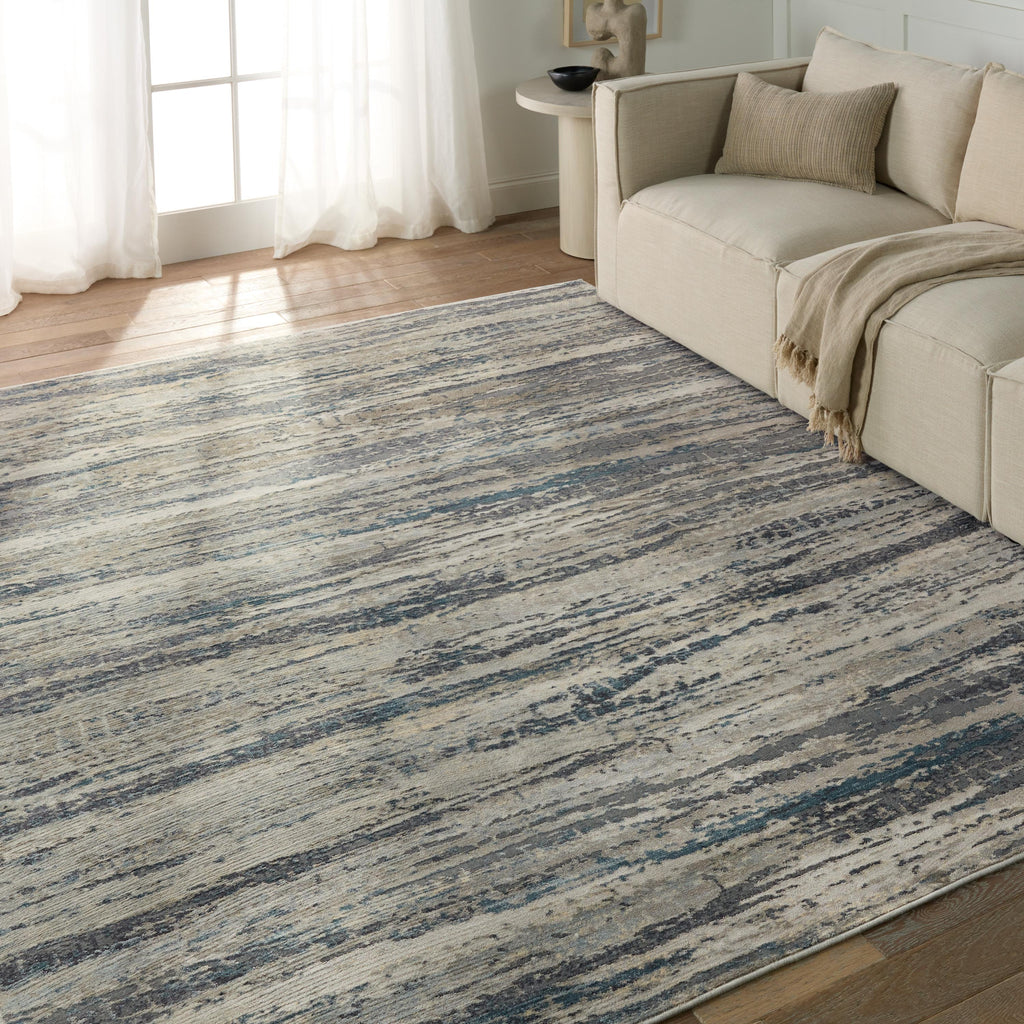 Jaipur Living Anomia Abstract Blue/ Taupe Area Rug (5'3"X7'6")