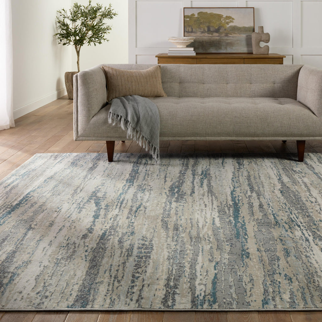 Jaipur Living Anomia Abstract Blue/ Taupe Area Rug (5'3"X7'6")