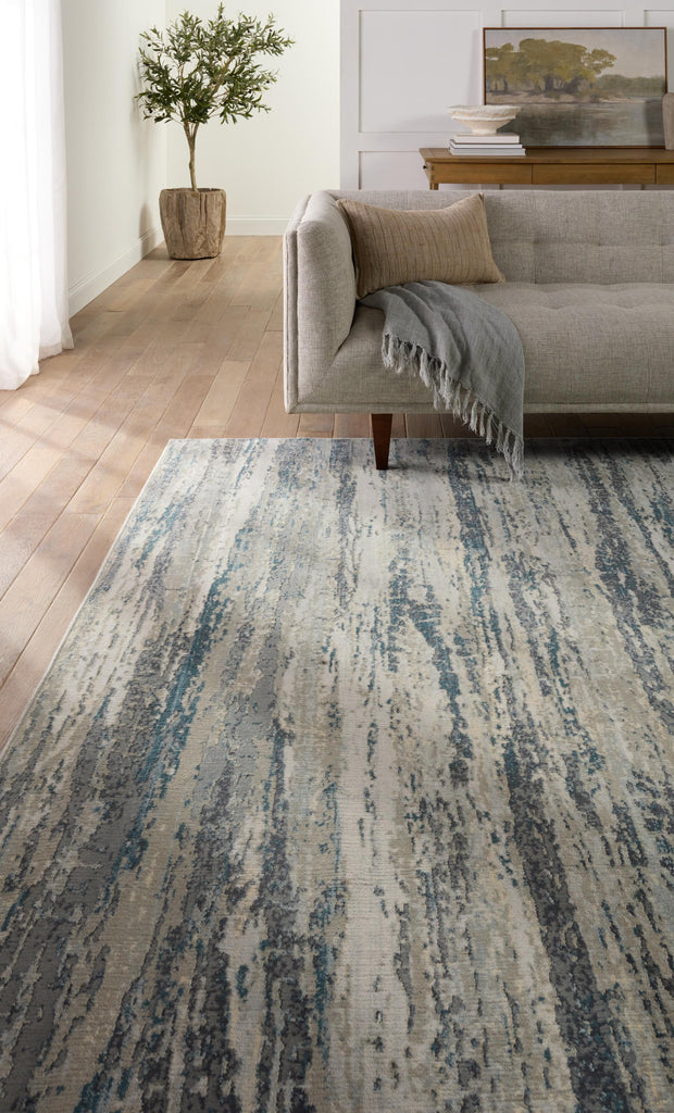 Jaipur Living Anomia Abstract Blue/ Taupe Area Rug (7'10"X9'6")