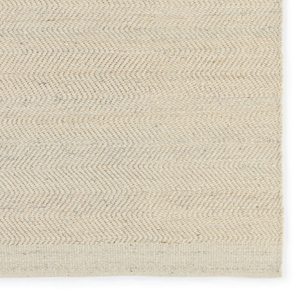 Kate Lester + Jaipur Living Esdras Handmade Solid Beige/ Ivory Area Rug (5'X8')
