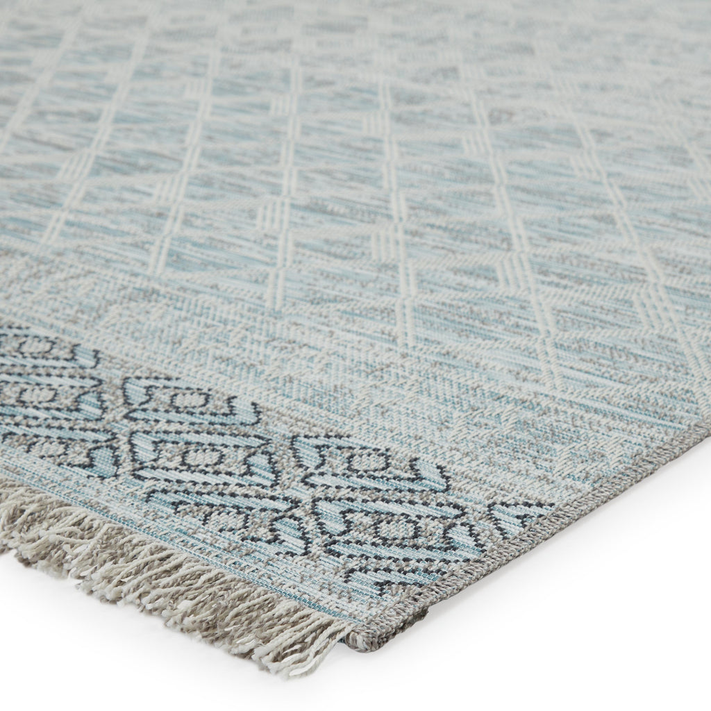 Jaipur Living Ravi Indoor/ Outdoor Bordered Light Blue/ Gray Area Rug (5'3"X7'6")